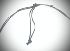 NK14959 RESIN BEAD/RING WITH BLACK  WAXCORD NECKLACE