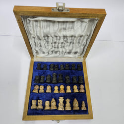 Stone chessboard with black and white squares, handcrafted design from Dastakaaristore, ideal for classic chess games.